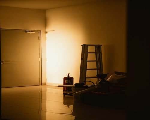 Holding a smartphone in a dimly lit room